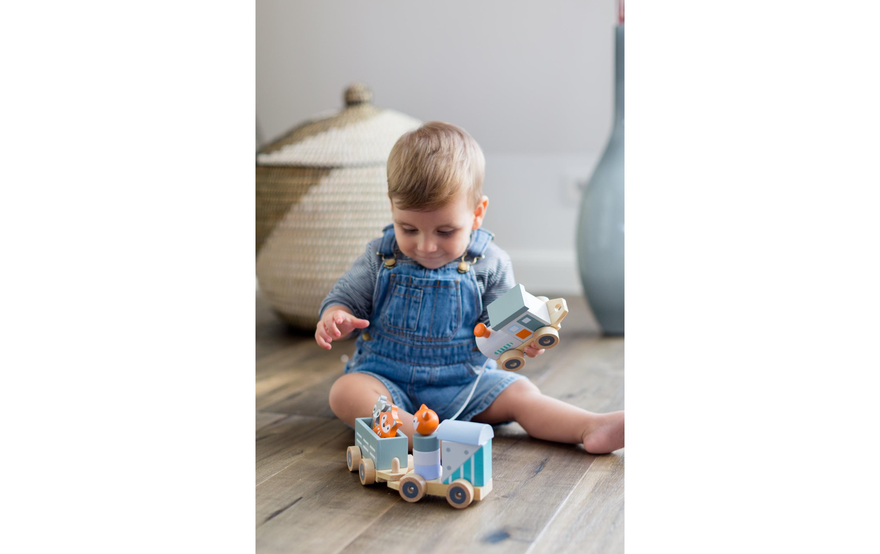 Kindsgut Nachziehspielzeug Holzeisenbahn grau