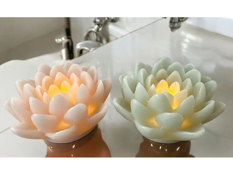 Dameco LED Wachskerze Lotus Blüte 2er Set rosa und türkis grün