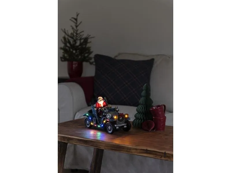 Konstsmide LED-Figur Weihnachtsmann im Auto, 16 cm
