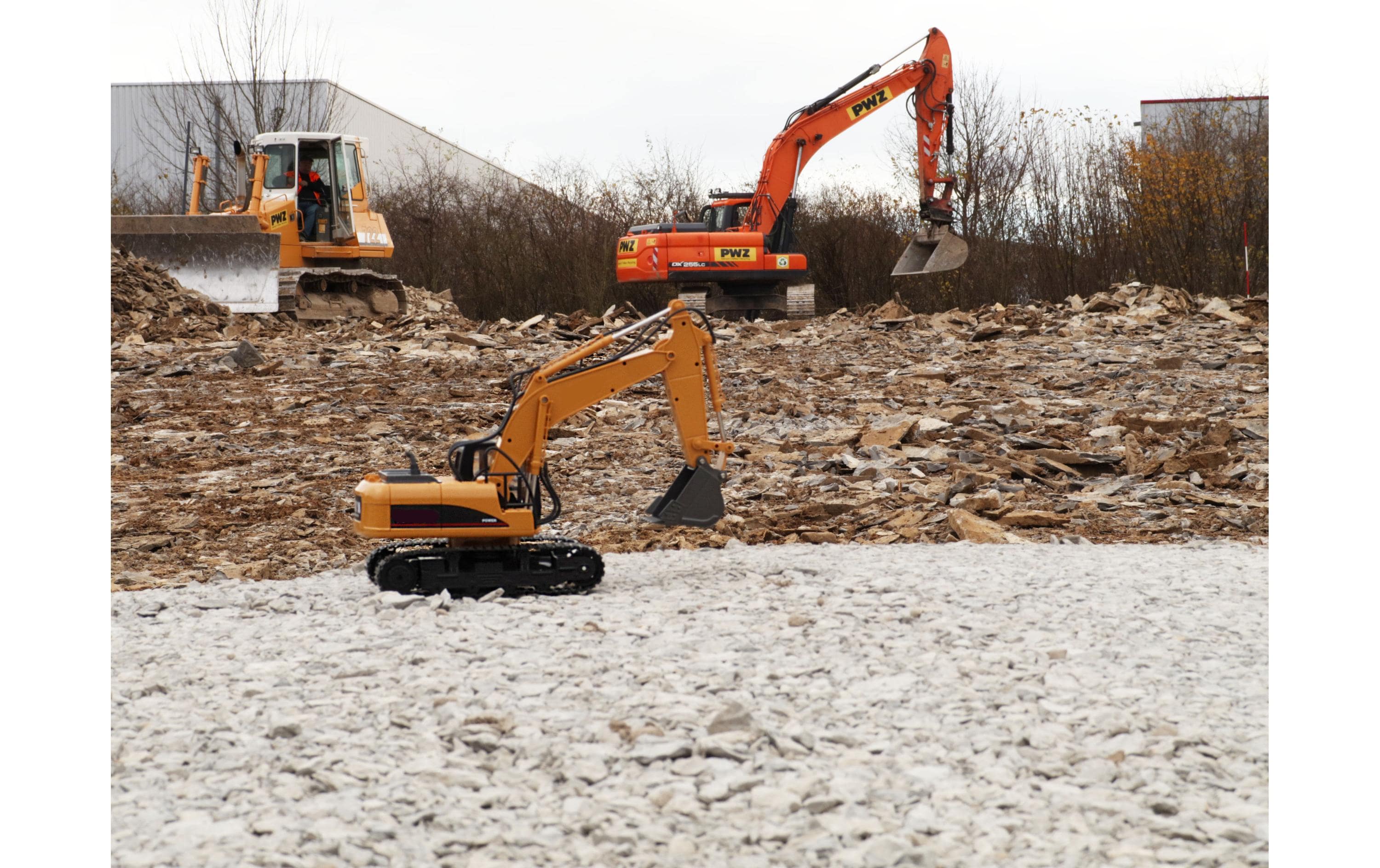 Amewi Bagger mit Metallschaufel, Licht & Sound RTR, 1:14