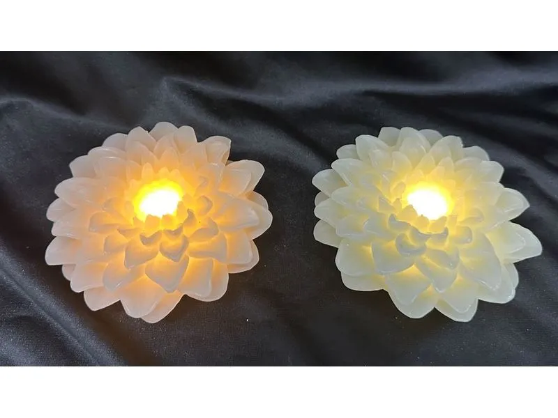 Dameco LED Wachskerze Rose Blüte 2er Set rosa und türkis grün Dameco LED Wachskerze Rose Blüte 2er Set rosa und türkis grün