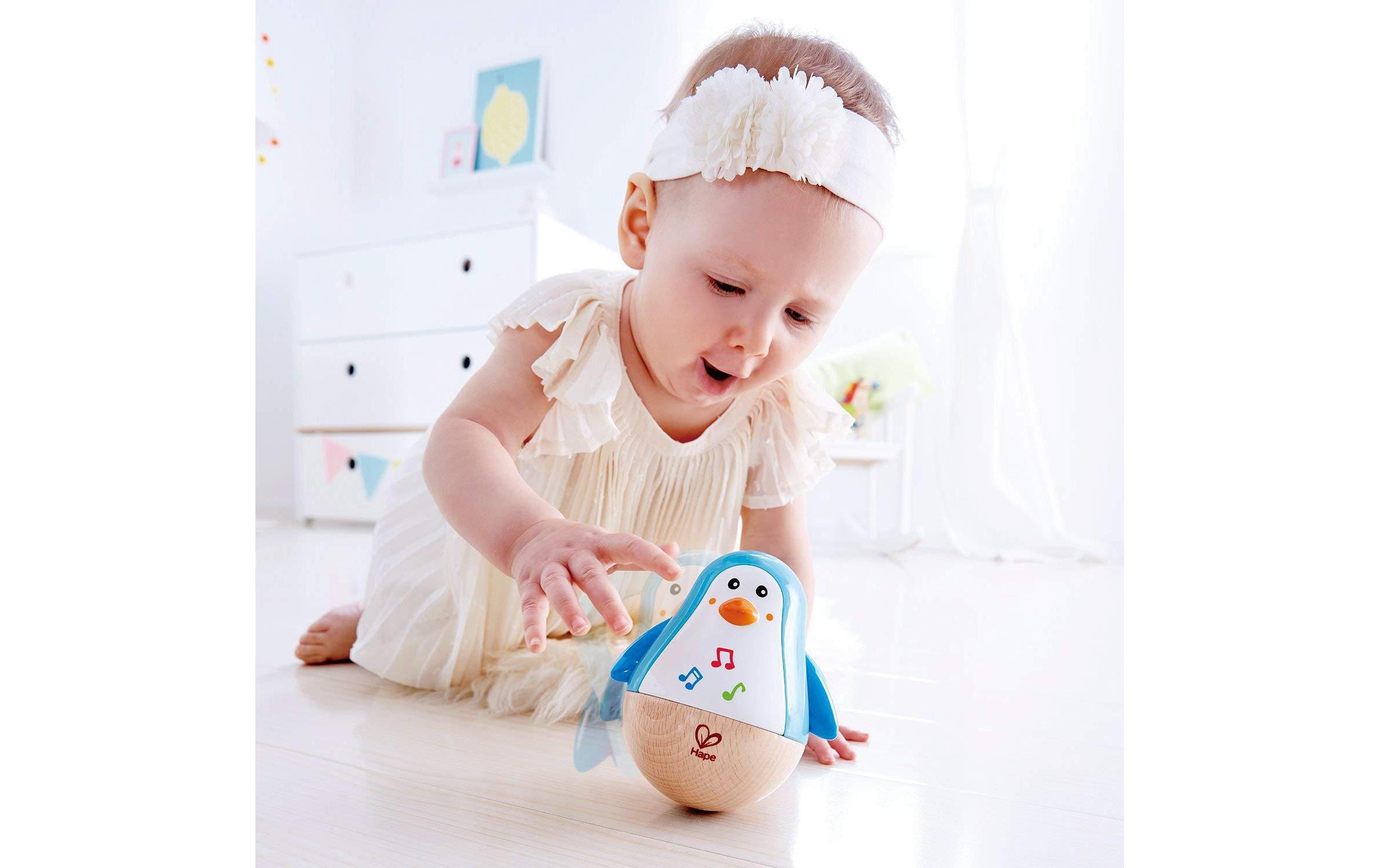 Hape Beschäftigungsspielzeug Stehauf-Pinguin